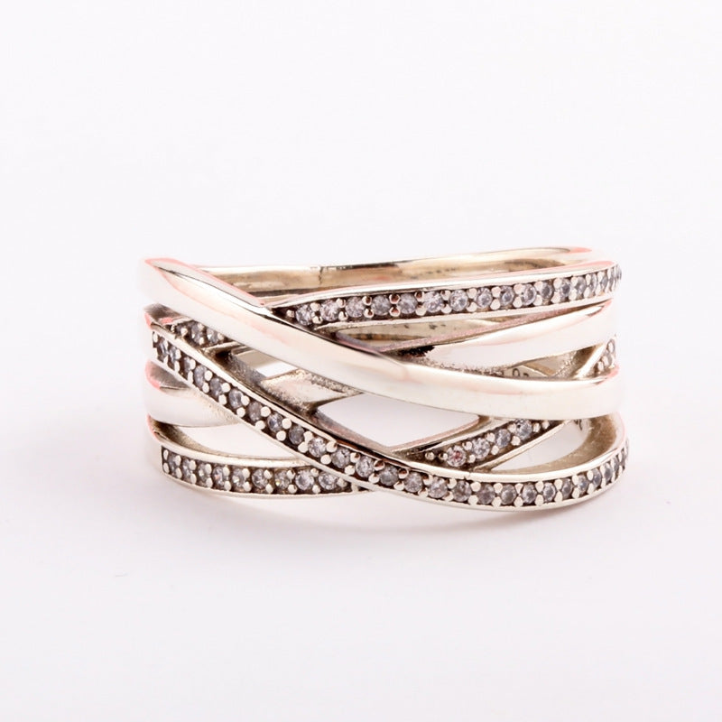 Classic Intertwined Rose Gold And Silver Ring